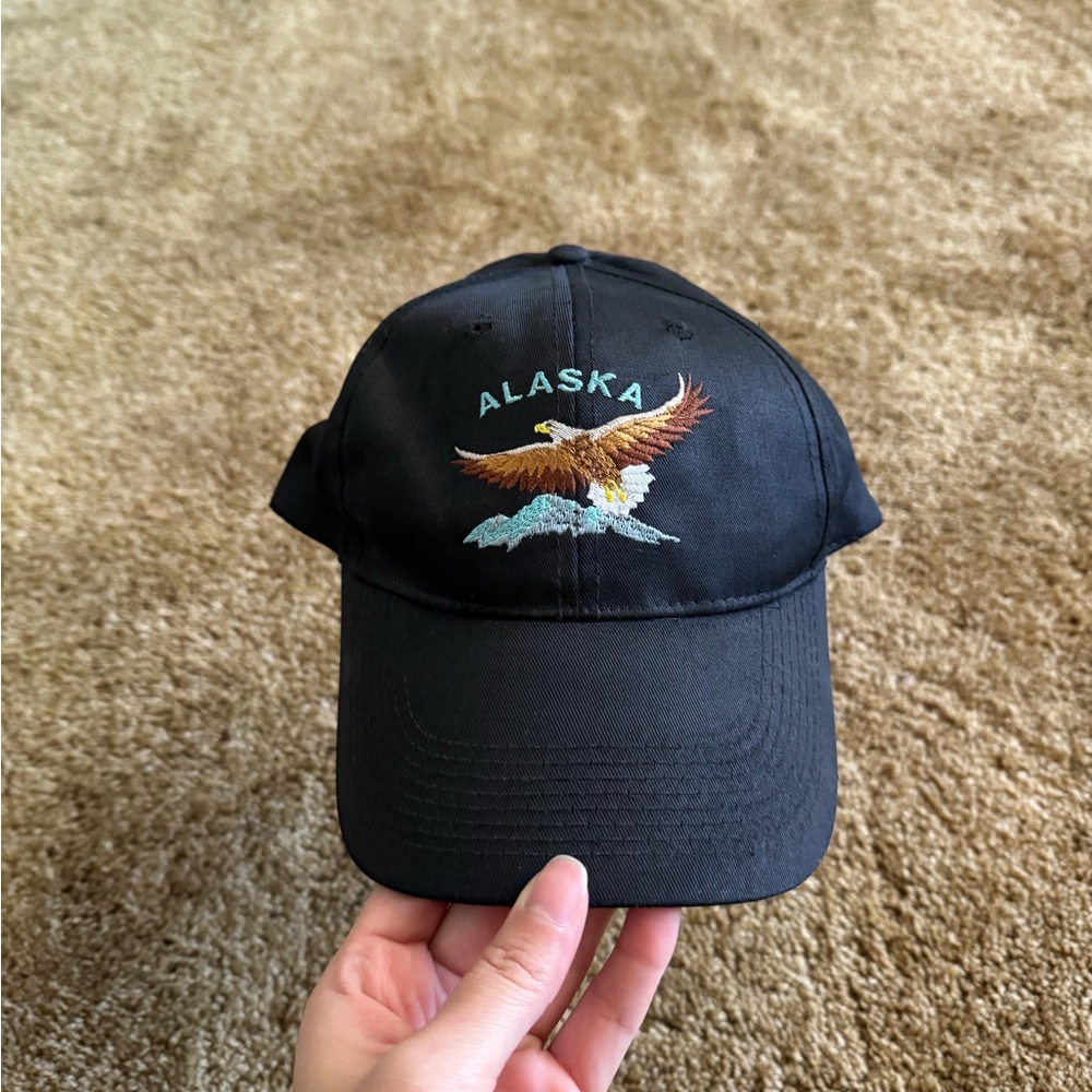 Black low profile snapback hat with Alaskan eagle graphic; excellent condition
